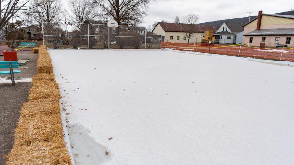 With help from local volunteers, the basketball court at Howard Community Park has been transformed into an ice rink.