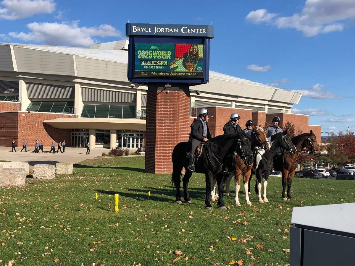 State police stage outside of a rally at the Bryce Jordan Center for former President Donald Trump on Saturday, Oct. 26, 2024. 