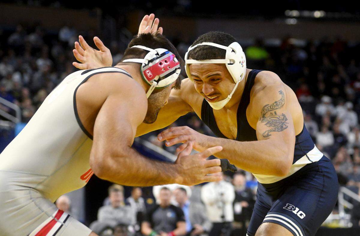 Penn State’s Aaron Brooks wrestles Ohio State’s Kaleb Romero in the 184 lb championship bout of the Big Ten wrestling championships at the Crisler Center on Sunday, March 5, 2023.