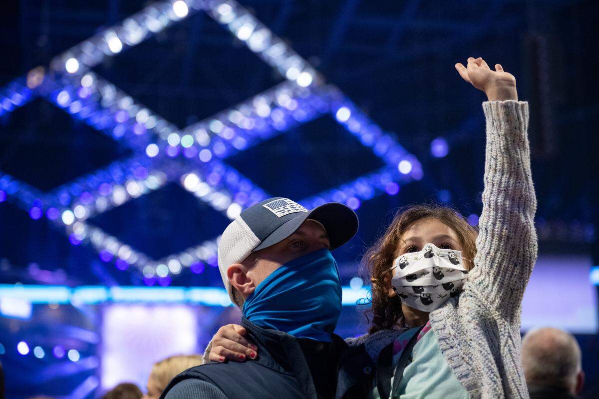 Elliana Rodenhauser waves to her Thon organization on Saturday during the Penn State IFC/Panhellenic Dance Marathon.