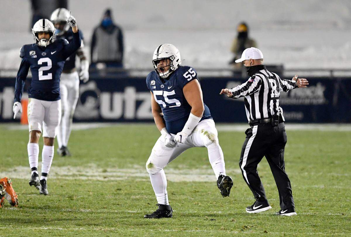 Penn State defensive tackle Antonio Shelton celebrates his sack of Illinois quarterback Isaiah William which caused a fumble that Penn State recovered during the game on Saturday, Dec. 19, 2020 at Beaver Stadium.