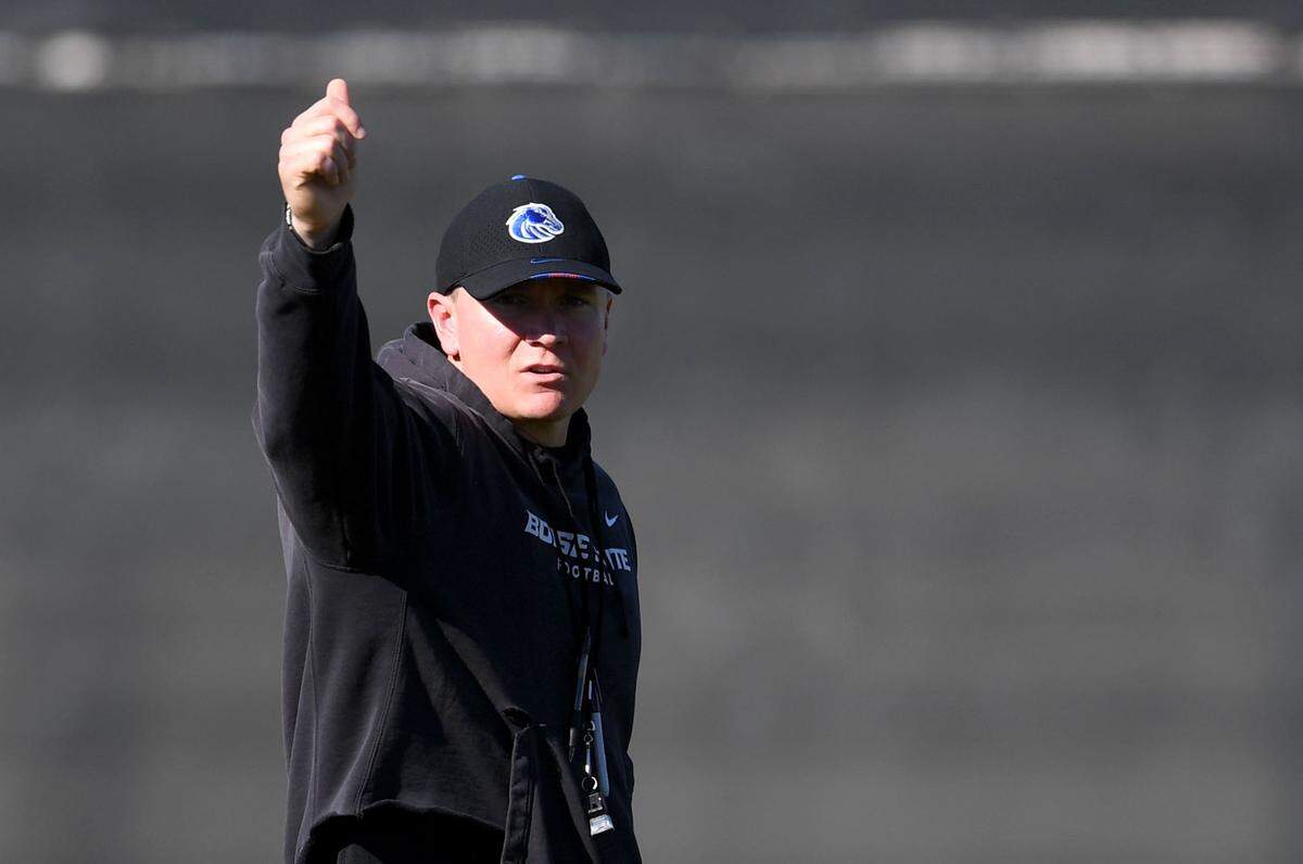 Boise State coach Spencer Danielson motions to his players during practice for the Fiesta Bowl on Sunday, Dec. 29, 2024 Indian School Park.