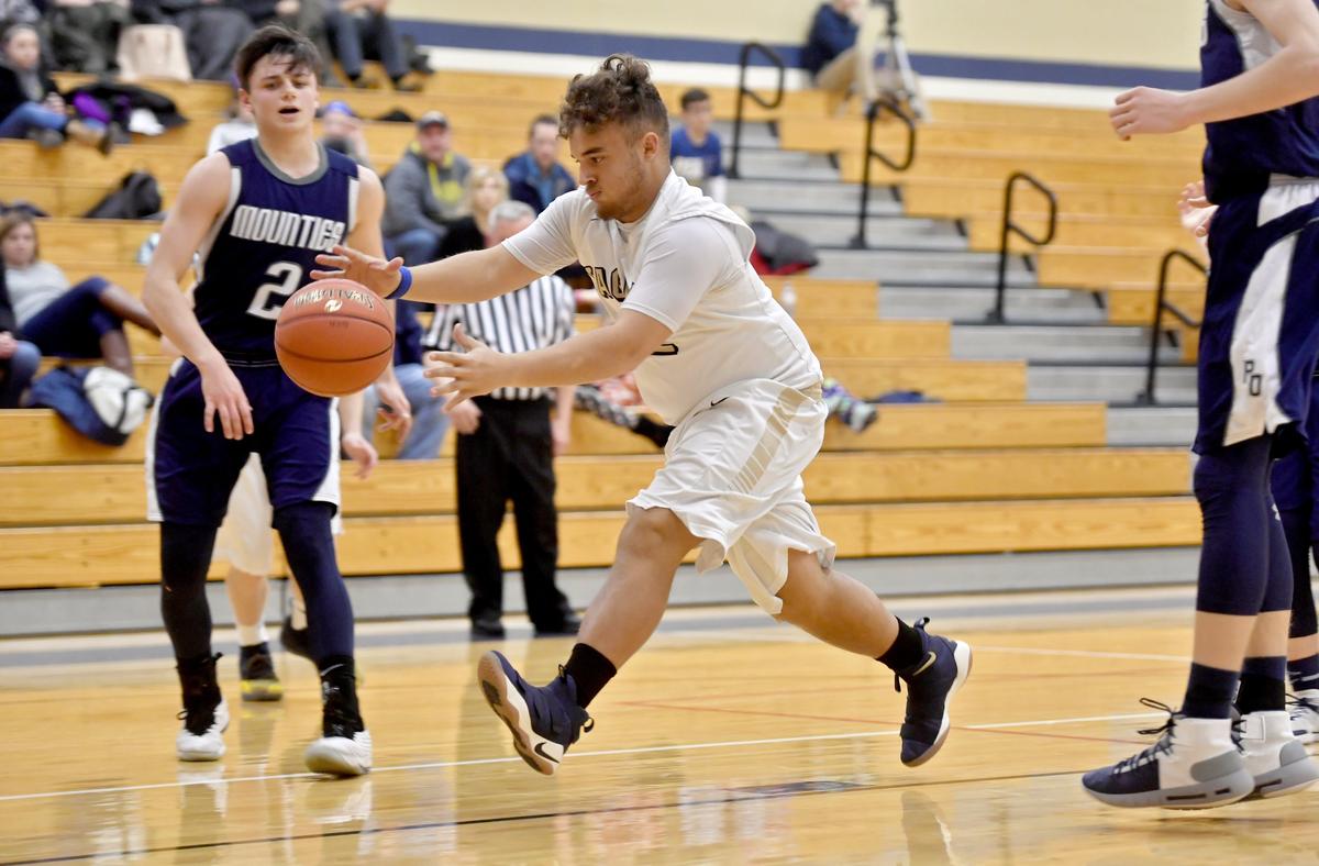 Bald Eagle Area’s Keith Greene reaches to toss the ball back in bounds during the game against Philipsburg-Osceola on Tuesday, Jan. 29, 2019.