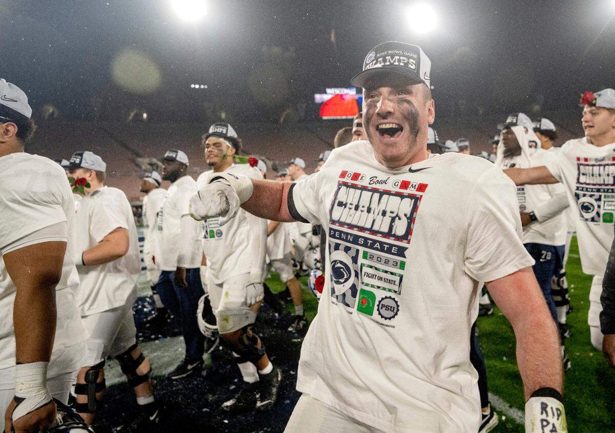 Penn State defensive end Nick Tarburton and his teammates celebrate the 35-21 win over Utah in the Rose Bowl on Monday, Jan. 2, 2023.
