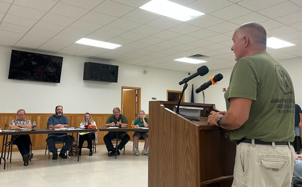 Marion Township resident Phil Lucas speaks to officials at a public hearing Wednesday for a potential rezoning in the township.