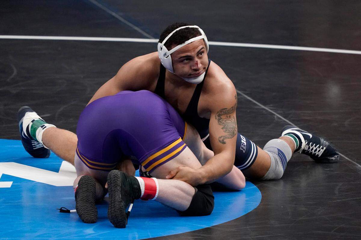 Penn State’s Aaron Brooks, top, will get a NCAA semifinals rematch when he takes on Northern Iowa’s Parker Keckeisen on Monday, saying both wrestler make the call.