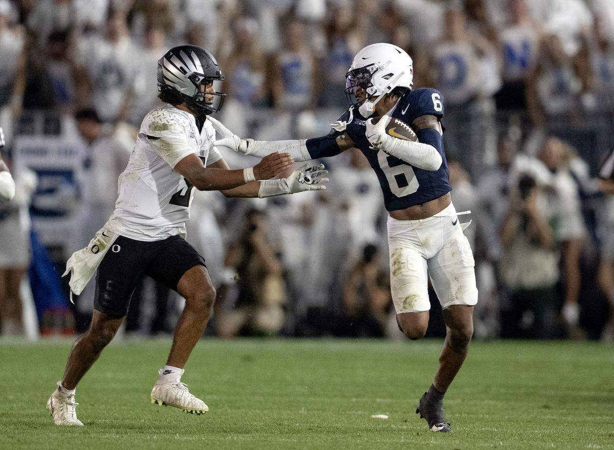 Penn State DB Zakee Wheatley runs with the ball on a fumble recovery that was called back on Saturday, Sept. 27, 2025.
