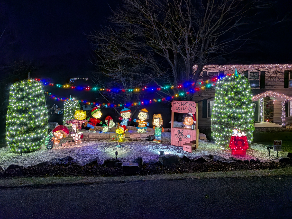 Peanuts characters skate around outside 1291 Pine Circle, Bellefonte.