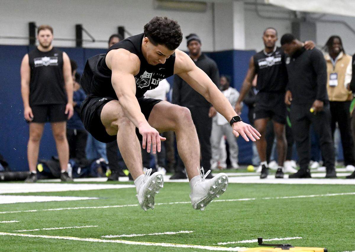 WR Trebor Pena does the broad jump during Penn State Pro Day on Wednesday, March 18, 2026. His best jump was 10-3.