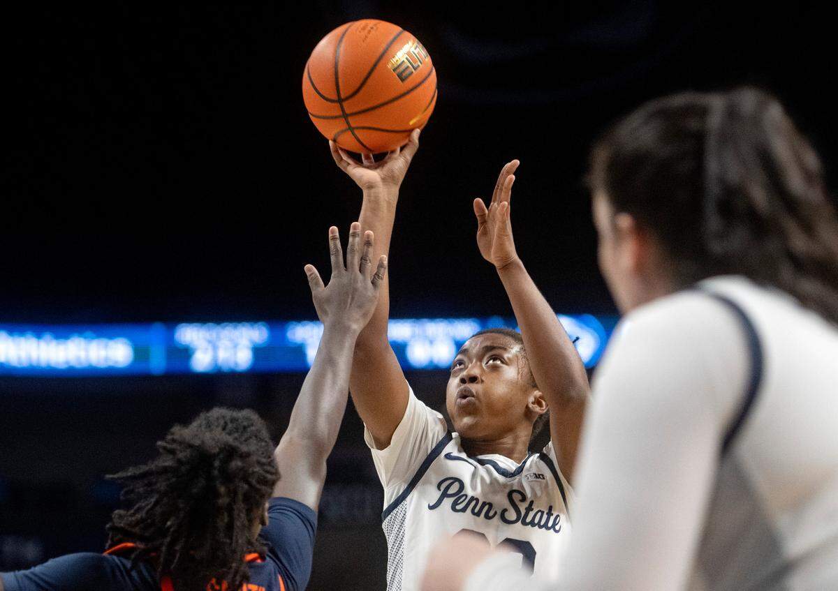 Penn State’s Taniyah Thompson shoots over Virginia defenders during the game on Wednesday, Nov. 30, 2022.