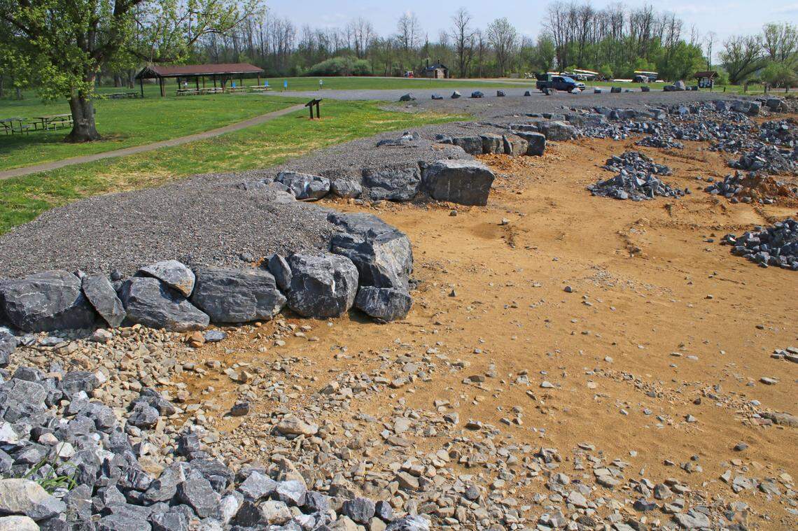 Stone framed deflectors were constructed along the lake to stop shoreline erosion and create a better place to fish.