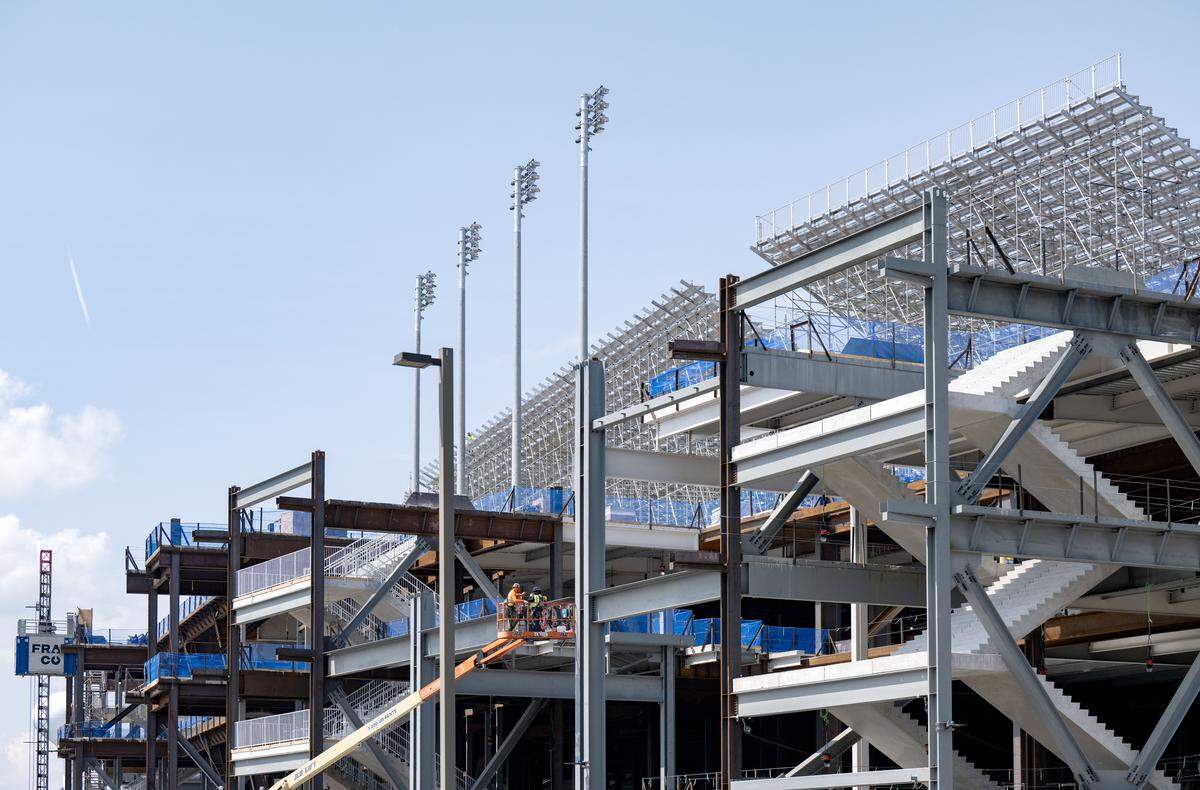Temporary stands and lights are being installed on the west side of Beaver Stadium on Tuesday, July 29, 2025.  