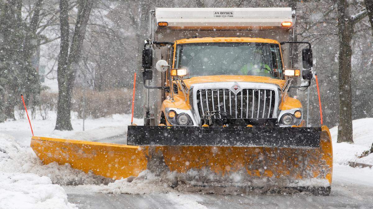 A borough snow plow clears West Hamilton Avenue during an ice storm Feb. 4, 2022, in State College. Ice is expected to hamper the Tuesday morning commute.