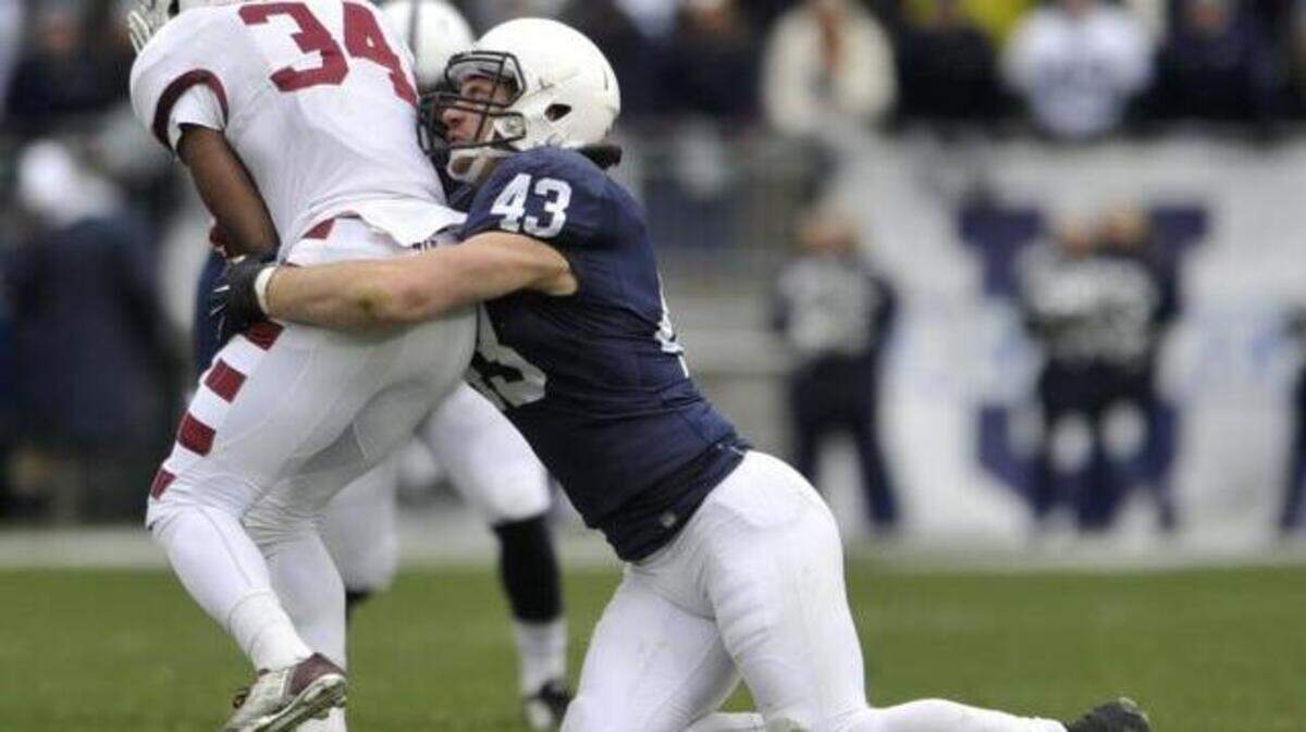 Penn State's Mike Hull wraps up Temple's Jahad Thomas on Saturday, Nov. 15, 2014.
