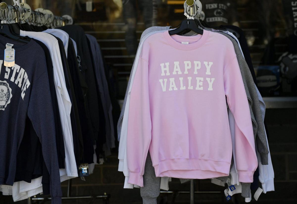 A rack of sweatshirts appears Tuesday, March 12, 2019, at Lion & Cub, which carries apparel with the words “Happy Valley.”