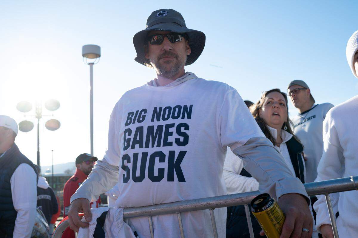 Robbie Millie wears a shirt protesting Big Noon while in line to watch ESPN College GameDay on Saturday, Nov. 2, 2024