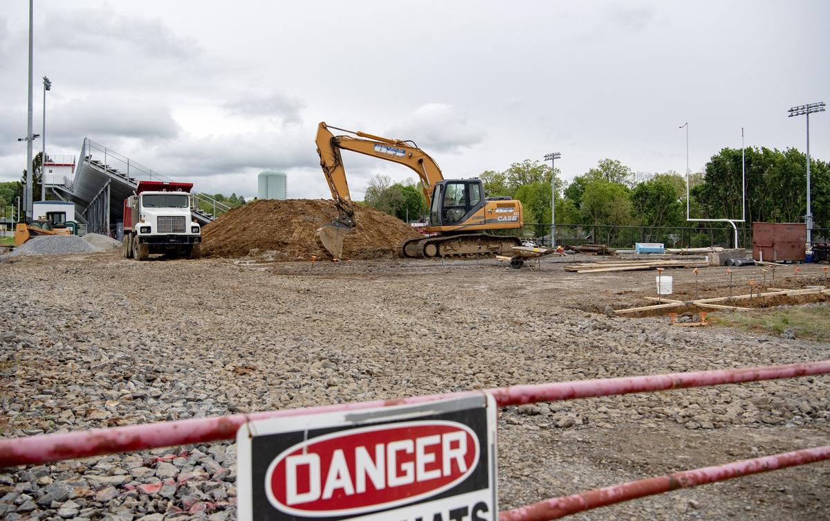 Dirt and construction equipment block the view of Bellefonte High School’s Rogers Stadium as construction continues on Tuesday, May 14, 2019.