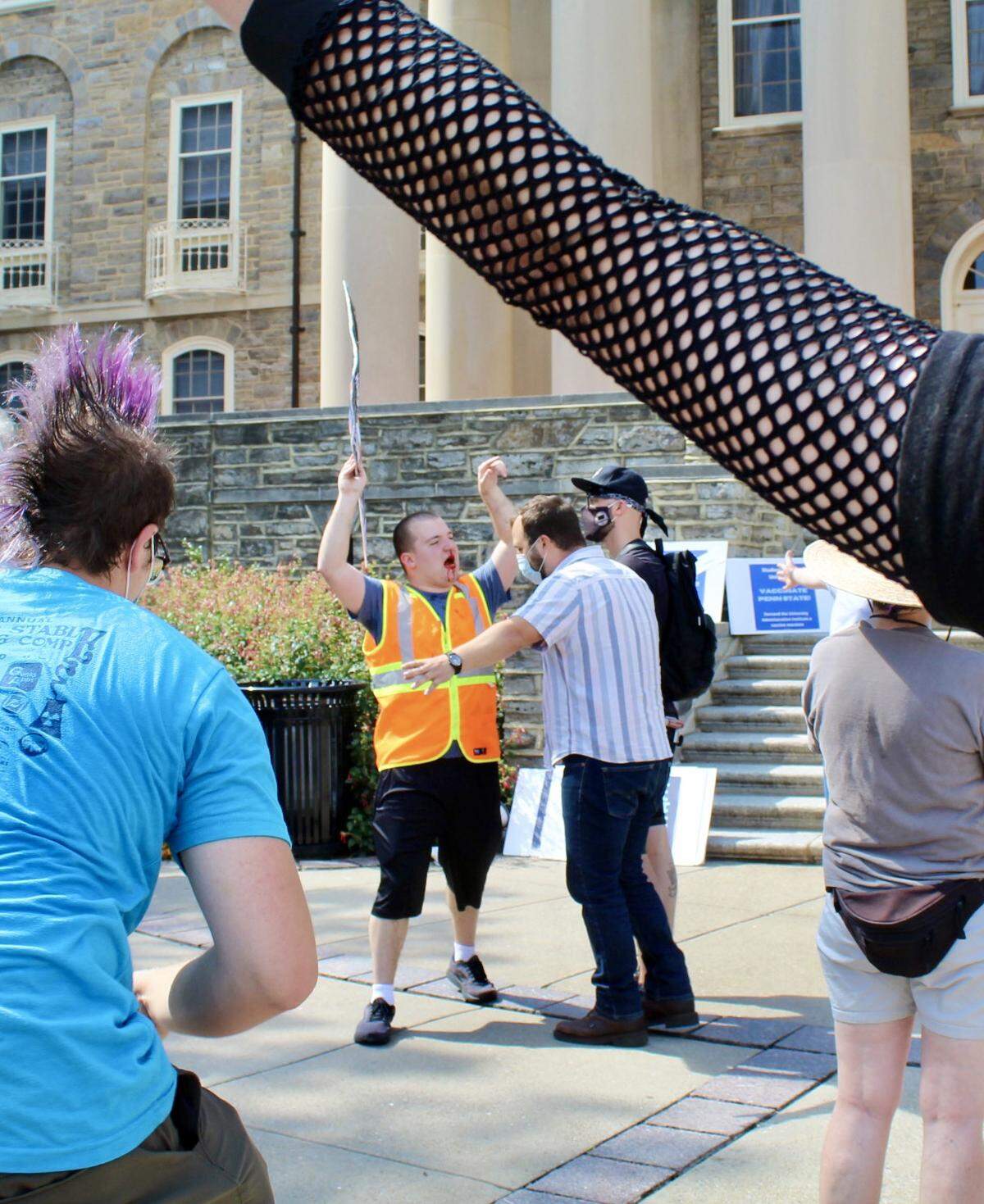A counter-protester had a bloody nose after some shoving during an Aug. 27 rally at Old Main to call on Penn State to require a COVID-19 mandate for students and staff.