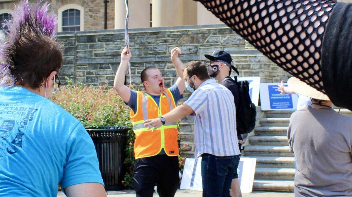 A Penn State professor faces charges after a counter-protester was injured during a scuffle at an Aug. 27 pro-vaccine rally on campus.
