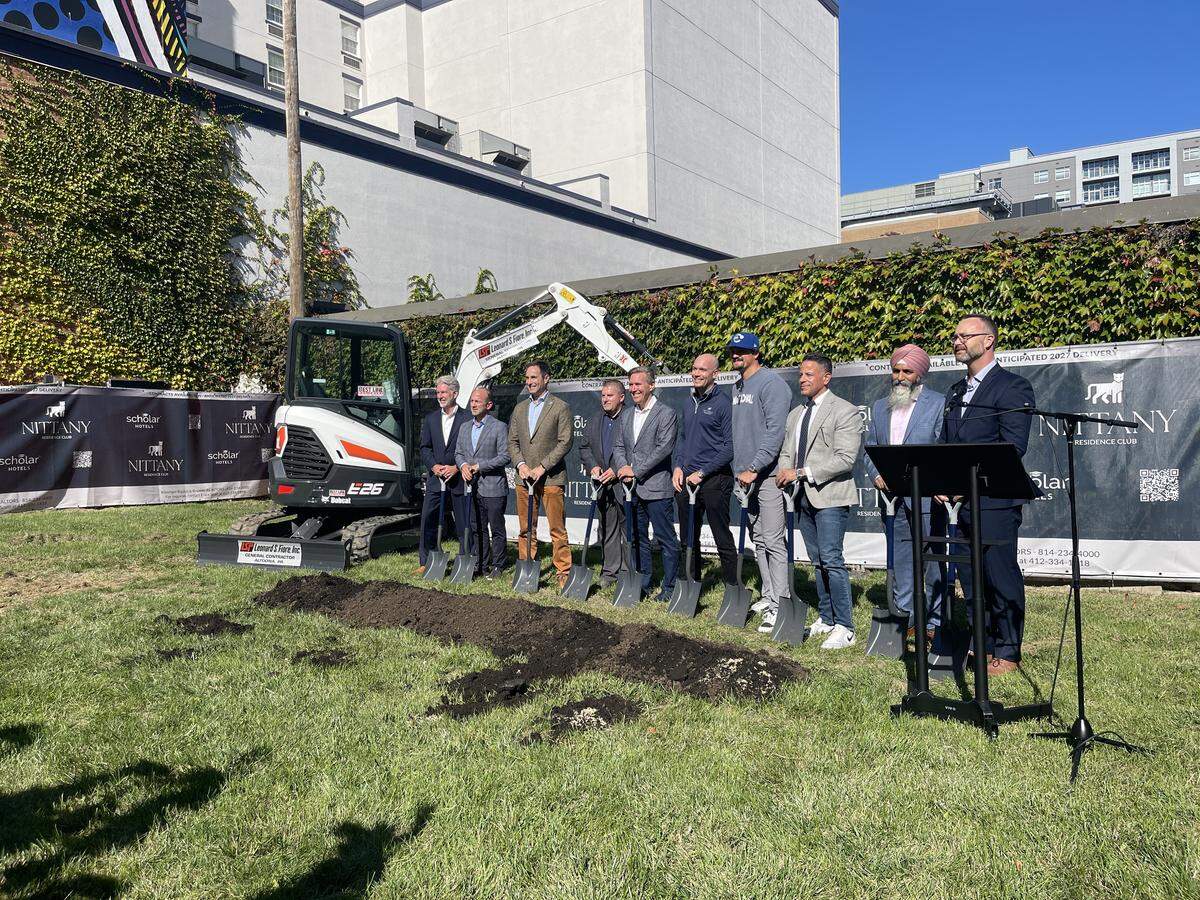 Project partners alongside Centre County business and development leaders and elected officials ceremoniously break ground on the new Nittany Residence Club at 321 West Beaver Ave., State College on Oct. 10.