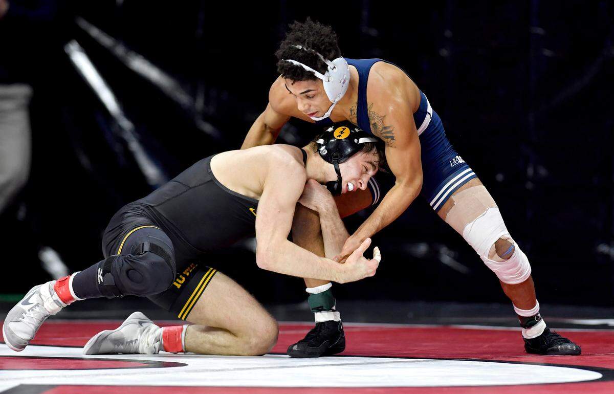 Penn State’s Roman Bravo-Young wrestles Iowa’s Austin DeSanto during the semi-finals of the Big Ten Wrestling championships at Rutgers on Saturday, March, 7, 2020.