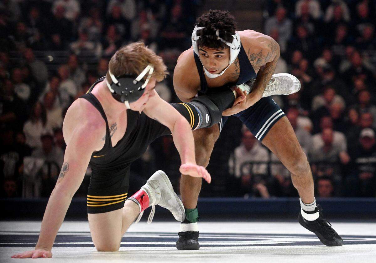Penn State’s Roman Bravo-Young controls Iowa’s Brody Teske in the 133 lb bout of the match on Friday, Jan. 27, 2023.