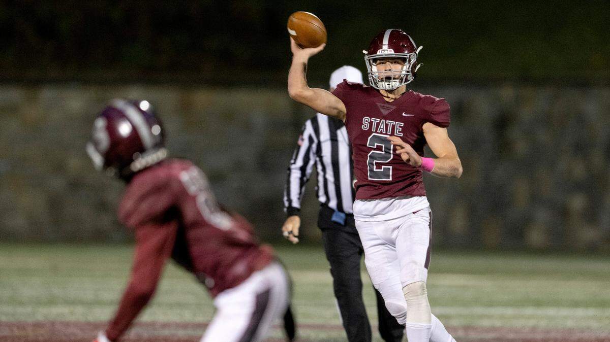 State College’s Finn Furmanek makes a pass to Donte Nastasi during the game against Cumberland Valley on Friday, Oct. 21, 2022 at Memorial Field.