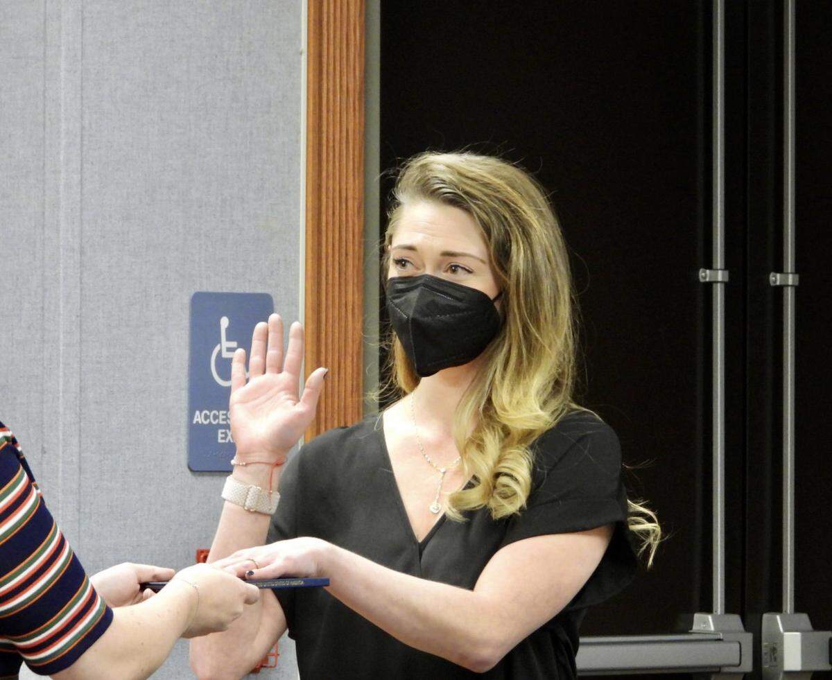 Hilary Caldwell is sworn in as a Ferguson Township supervisor on Monday. The meeting marked the first time in the township’s 220-year history it had an all-female board of supervisors. 