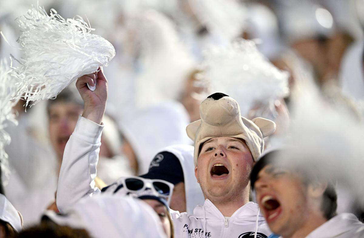 The Penn State student section cheers during the White Out game against Washington on Saturday, Nov. 9, 2024.