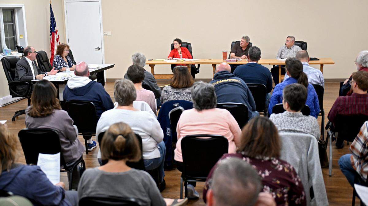 Benner Township supervisors Kathy Evey, Randy Moyer and Larry Lingle listen to solicitor Rod Beard during an Oct. 7 meeting.