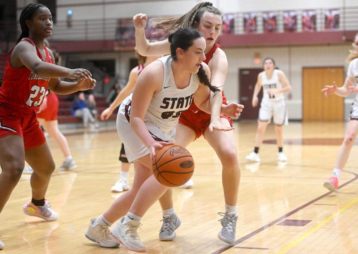 State College’s Tori Risha dribbles around a Cumberland Valley defender during the game on Tuesday, Jan, 24, 2023.