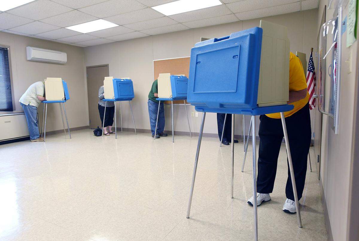 Locals vote at the Walker Township Municipal Building in this file photo taken in May 2018. May 21 is the primary election date this year.