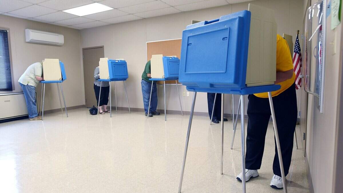 Locals vote in the primary election on May 15 at the Walker Township Municipal Building. Centre County is scheduled to replace 20-year-old voting machines to comply with a Pennsylvania Secretary of State mandate.