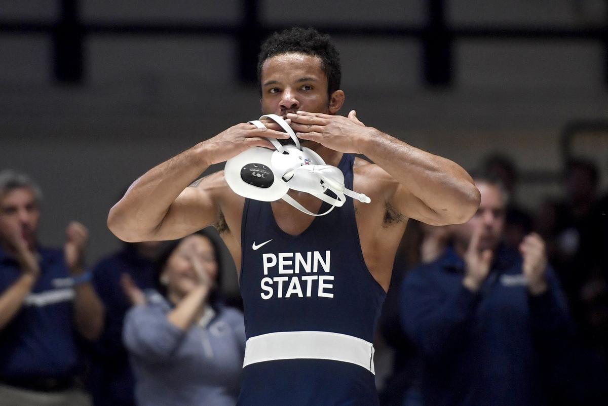 Penn State’s Mark Hall blows a kiss to the crowd after winning his 174 lb bout which was his 100th career win during the match against Penn on Sunday, Dec. 8, 2019.