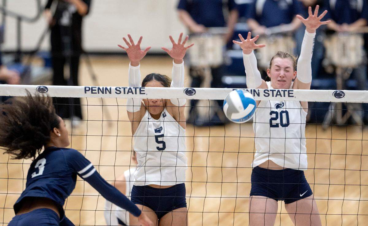 Penn State’s Seleisa Elisaia and Allie Holland block a shot from Howard’s Bria Woodard during the match on Friday, Sept. 16, 2022.