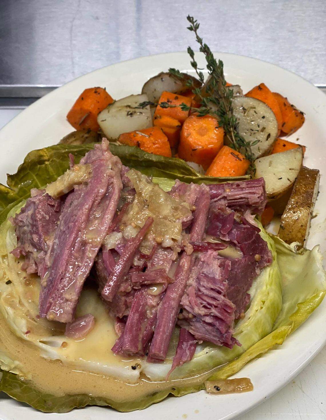 The We Are Inn’s premier St. Patrick’s Day dish offers oven-braised corned beef brisket served over cabbage with carrots, potatoes and a salad on the side.