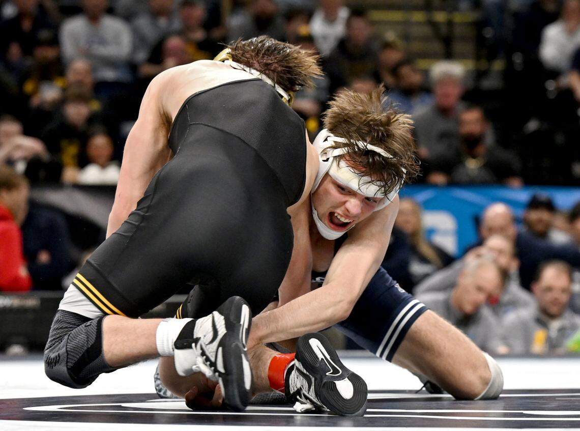 Penn State's Marcus Blaze reaches for Iowa State’s Drake Ayala in sudden victory of the 133-pound semifinal bout at the Big Ten wrestling championships on Saturday, March 7, 2026 at the Bryce Jordan Center.