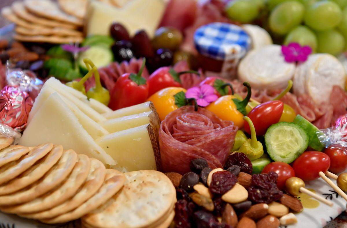 A charcuterie plate with a salami rose by Regina Brannen of The Queen’s Cheese on Thursday, Jan. 14, 2021.