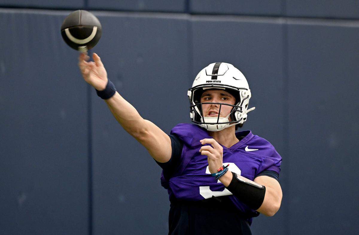 Penn State quarterback Rocco Becht makes a pass during spring practice on Thursday, March 26, 2026.  