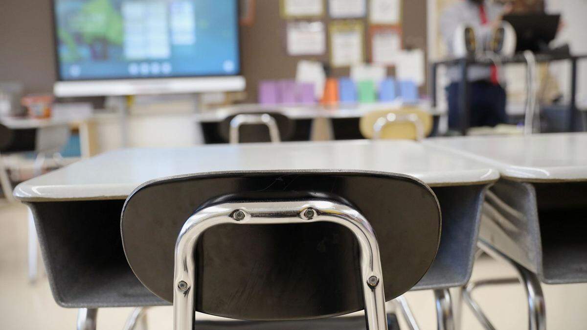 Desks and chairs sit empty in a classroom at Loring Flemming Elementary School in Blackwood, N.J.
