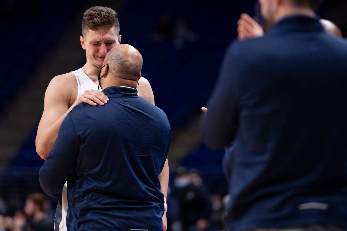 Penn State forward John Harrar (21) shows emotion after hugging Penn State head coach Micah Shrewsberry during a game between Penn State and Nebraska at the Bryce Jordan Center on Feb. 27.