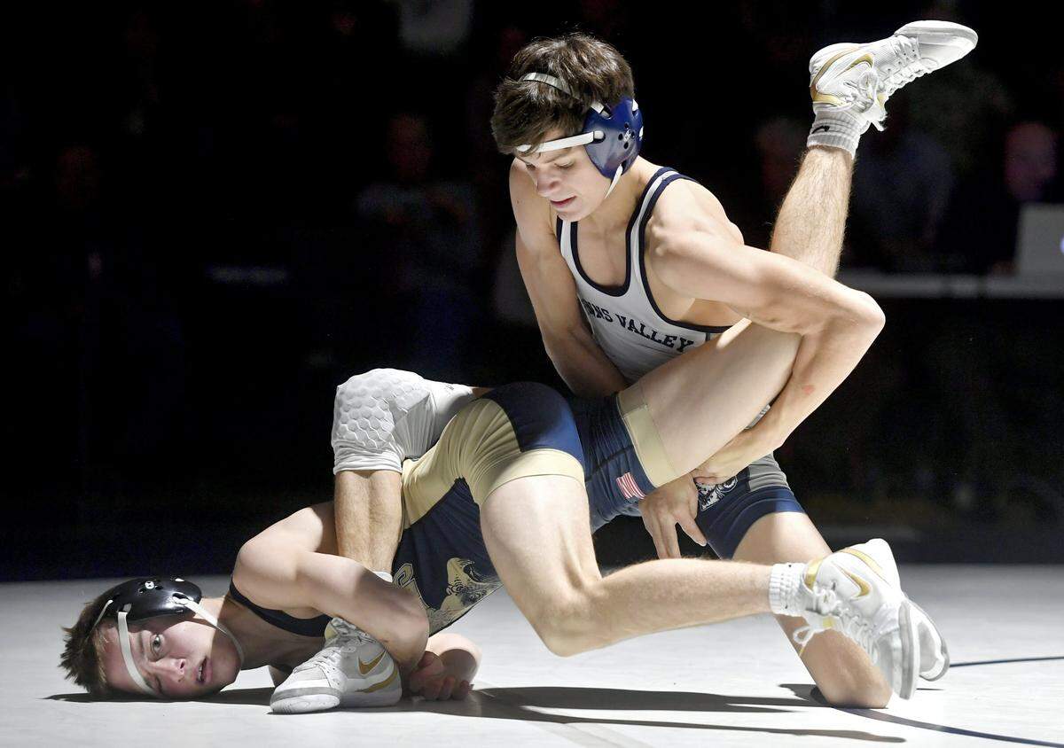 Penns Valley’s Baylor Shunk controls Bald Eagle Area’s Garret Giedroc in their 120-pound bout on Jan. 3, 2019. Shunk won by tech fall.