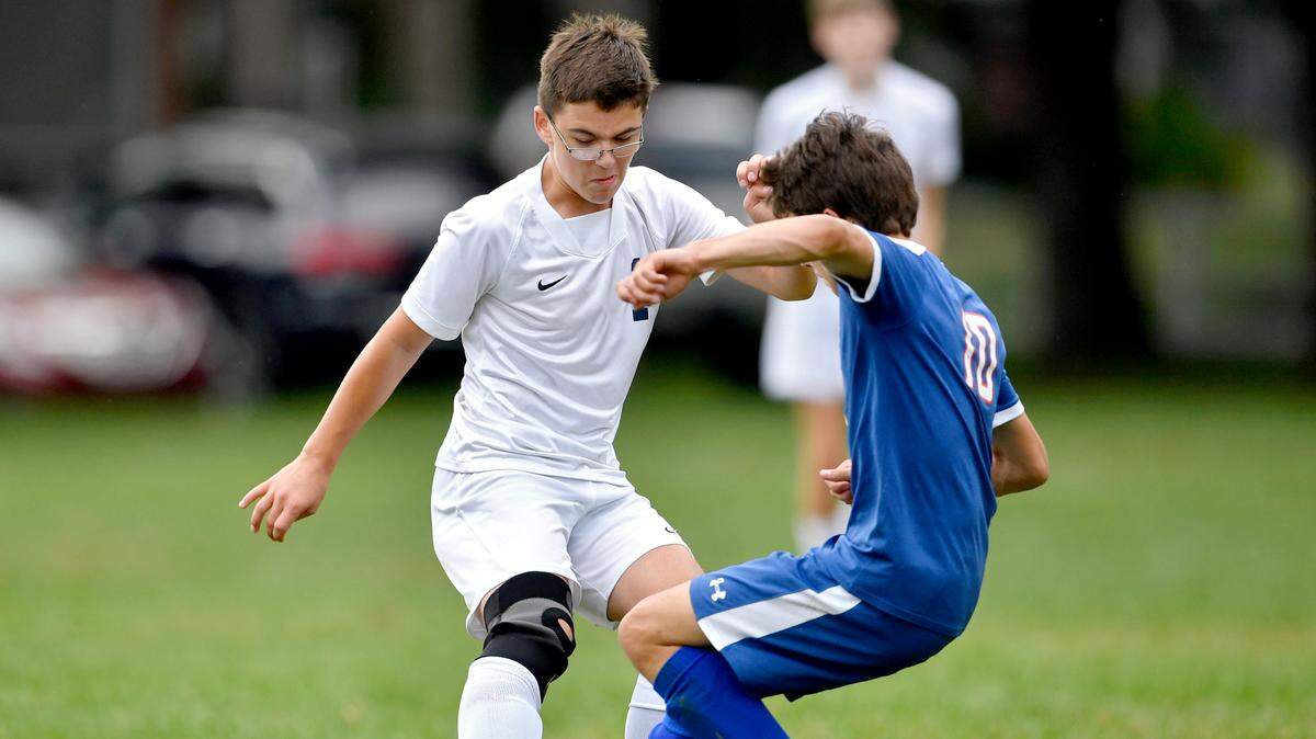  Philipsburg-Osceola's Justin Ivicic and Saint Joseph's Kyle Yangula battle for the ball during the game on Thursday, Sept. 16, 2021.  