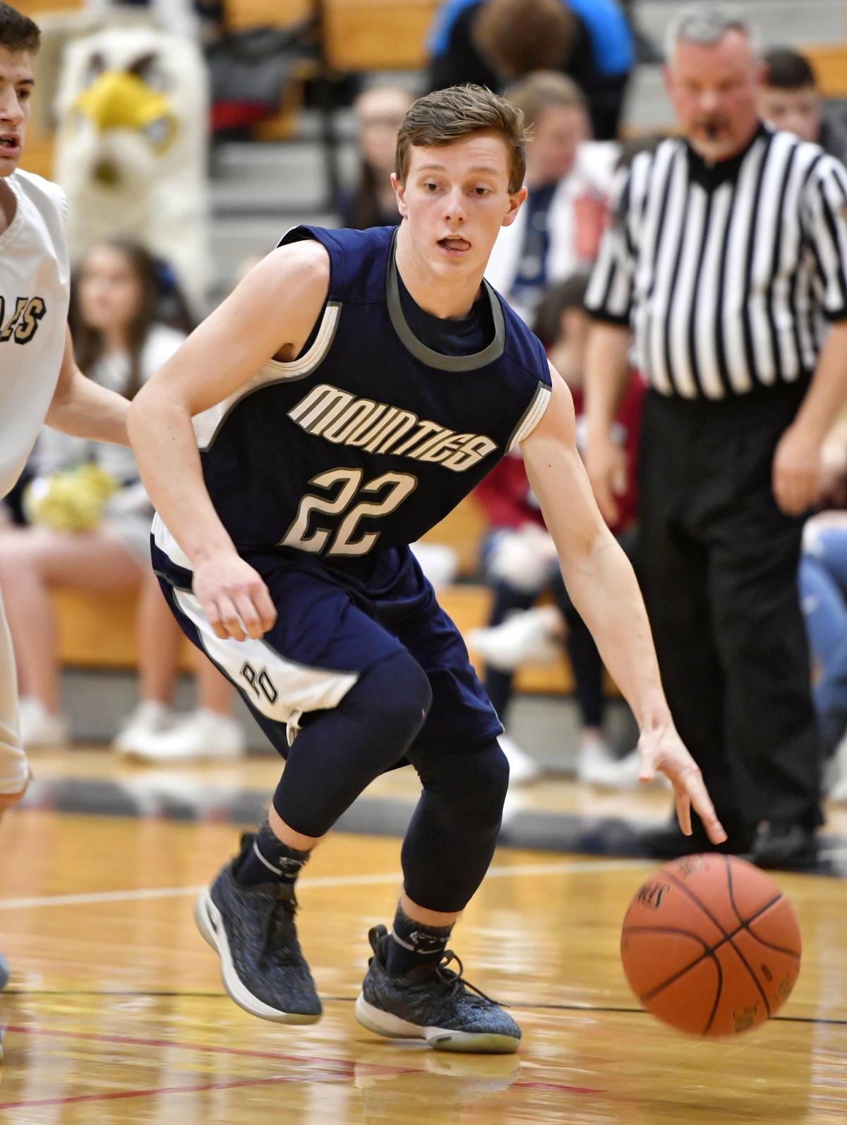 Philipsburg-Osceola’s Ryan Kephart dribbles down the court with the ball from a Bald Eagle Area defender during the game on Tuesday, Jan. 29, 2019.