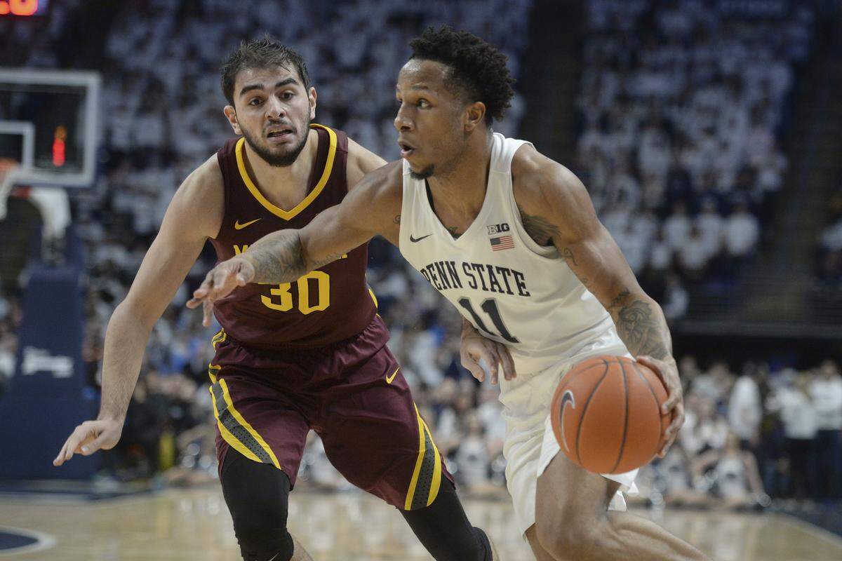 Penn State’s Lamar Stevens (11) drives the baseline on Minnesota’s Alihan Demir (30) during second-half action of Saturday’s basketball game at the Bryce Jordan Center.