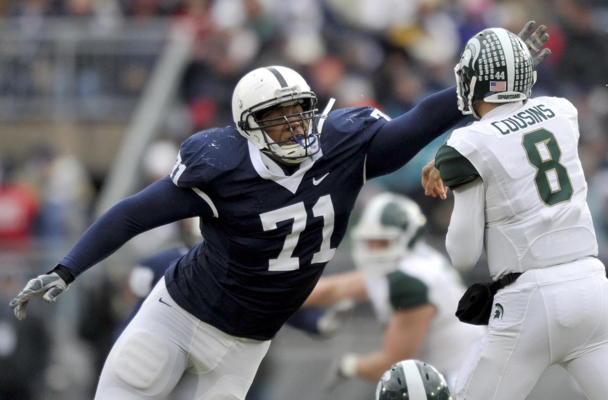 Penn State's Devon Still pressures Michigan State's Kirk Cousins on Saturday, November 27, 2010. CDT/Christopher Weddle