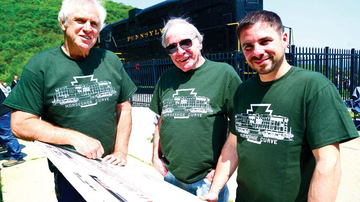 Dan Moringiello, left, with his brother Jim Adams Sr., center, and Jim’s son James visit the Horseshoe Curve.