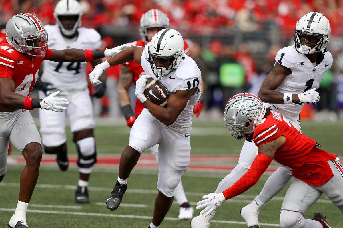 Oct 21, 2023; Columbus, Ohio, USA;  Penn State Nittany Lions running back Nicholas Singleton (10) runs the ball against the Ohio State Buckeyes during the second quarter at Ohio Stadium. Mandatory Credit: Joseph Maiorana-USA TODAY Sports