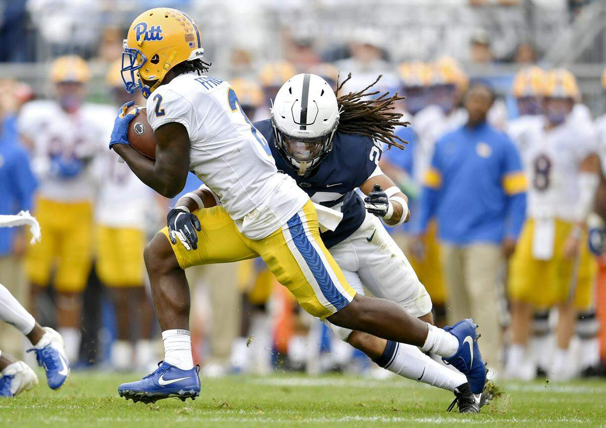 Penn State safety Jonathan Sutherland stops Pitt’s Maurice Ffrench during the game against Pitt on Saturday, Sept. 14, 2019.