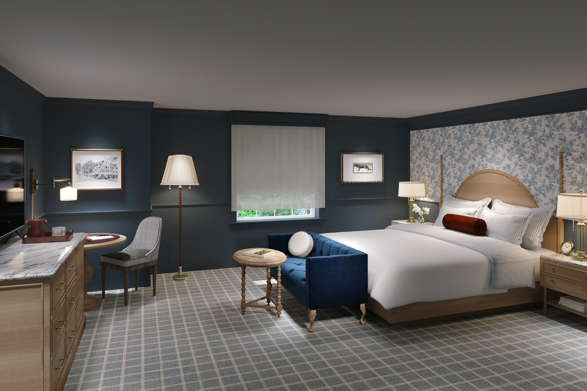 A rendering of a room with a king sized bed at the newly renovated Nittany Lion Inn.
